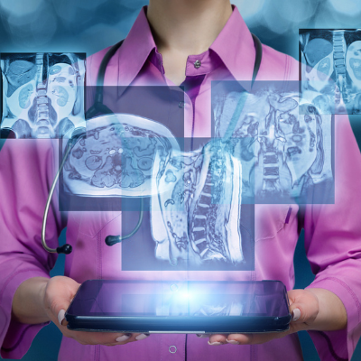 Doctor holding laptop with radiology images