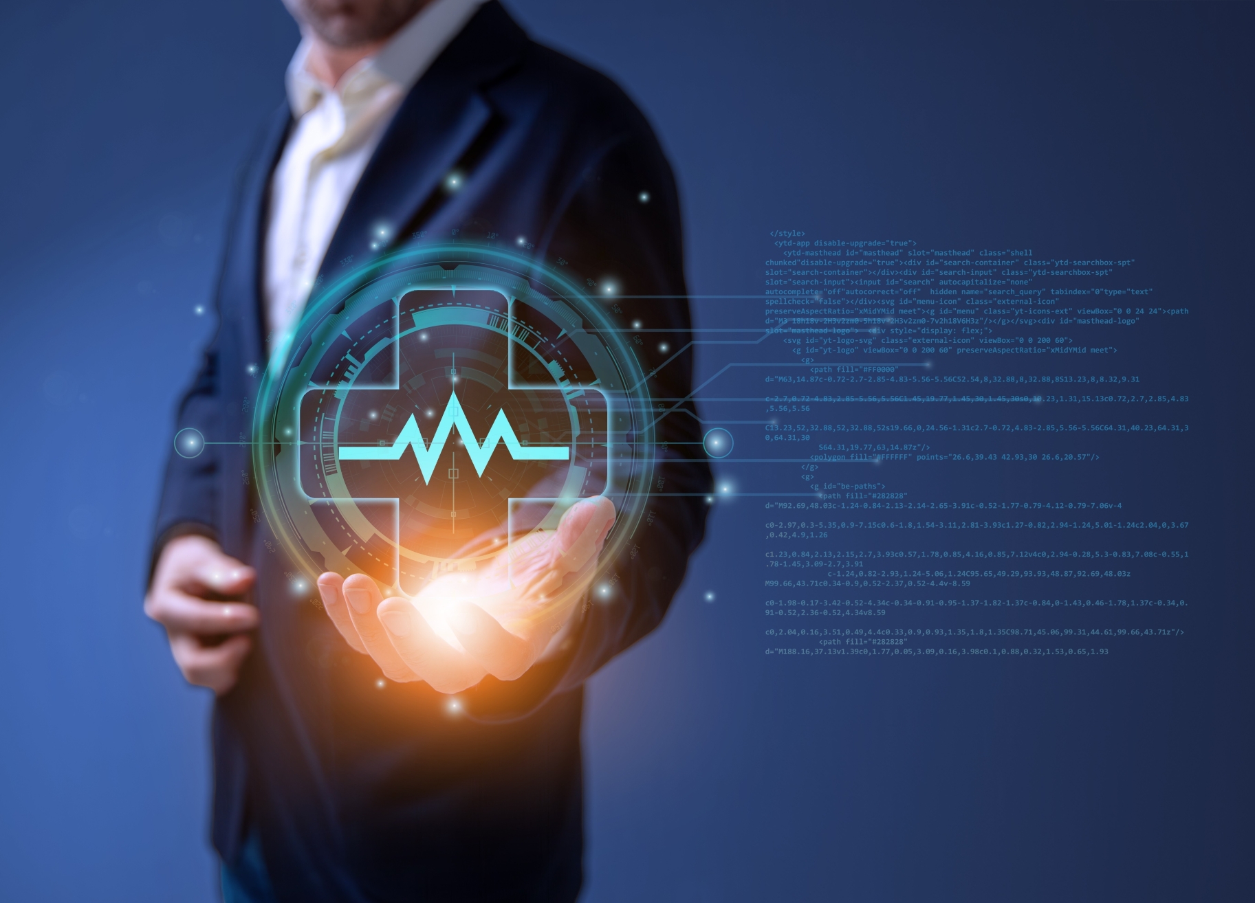 Close up of a man holding up an illustration of a heart monitor line within a medical cross