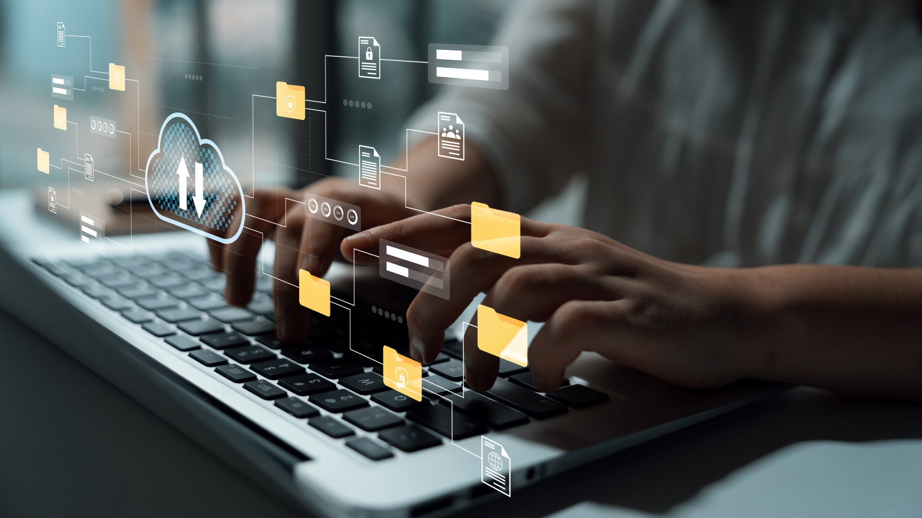 Close up of a person typing on a laptop keyboard, while illustrations of files hover above